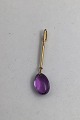 Danam Antik 
presents: 
Georg 
Jensen 18K Gold 
Pendant Dew 
Drop No. 1128 
Amethyst Torun