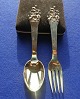 Antikkram 
presents: 
The 
Swineherd 
children's 
cutlery in 
Danish 
gold-plated 
solid silver. 
Set spoon & 
fork