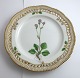 Lundin Antique 
præsenterer: 
Royal 
Copenhagen, 
Flora Danica. 
Frokost 
tallerken med 
gennemskåret 
bort. Design 
...