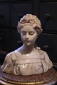 K&Co. presents: 
Decorative 
French 19th 
century bust of 
a young woman 
in carved 
solid marble...