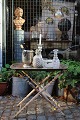 K&Co. presents: 
Old tray 
table with 
wooden base 
with a really 
nice patina and 
large raw metal 
tray on top...