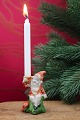 K&Co. presents: 
Small 
biscuit gnome 
with a nice 
patina that 
holds a small 
Christmas 
candle...