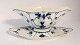 Lundin Antique 
presents: 
Royal 
Copenhagen. 
Blue fluted, 
plain. Sauce 
bowl. Model 
202. Length 
24.5 cm. (1 ...