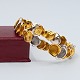 Antik 
Damgaard-
Lauritsen 
presents: 
Carl 
Antonsen; 
Bracelet in 14k 
gold and white 
gold