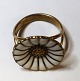 Lundin Antique 
presents: 
Georg 
Jensen. Daisy 
Ring sterling 
silver with 
white enamel 
(925). Ring 
size 51.