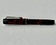 Reutemann Antik 
presents: 
Black and 
red-brown 
marbled Penol. 
No. 1 fountain 
pen.