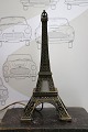 K&Co. presents: Old miniature Eiffel Tower in metal with light inside. H: 35cm...