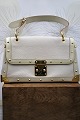 K&Co. presents: Louis Vuitton vintage bag, Suhali Le Talentueux from 2006 in white leather with gold rivets...