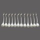 Antik Damgaard-Lauritsen presents: Georg Jensen; Set of 12 Magnolia/Blossom coffee spoons of sterling silver