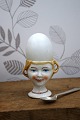 K&Co. presents: Old egg cup from the 1930s in porcelain with a painted funny face.
