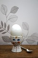 K&Co. presents: Old egg cup from the 1930s in porcelain with a painted funny face.