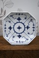 K&Co. presents: 8-sided saucer in Fluted Blue Plain from Royal Copenhagen. 1/230.From 1898-1923...
