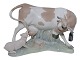 Antik K presents: Lladro (Spain) figurineCow with small pig