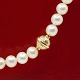 Antik Damgaard-Lauritsen presents: Per Borup; A pearl necklace with clasp in 14k white gold