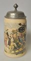 Pegasus – Kunst - Antik - Design präsentiert: Deutscher Fayence krug mit Zinndeckel, 1909.