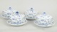 L'Art presents: Royal Copenhagen, Blue Fluted Plain set of four bouillon cups with saucers.