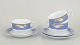 L'Art presents: Royal Copenhagen Blue Magnolia, set of three teacups with matching saucers.
