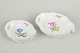 L'Art presents: Meissen, set of two dishes with polychrome flower decoration.