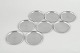 L'Art presents: Just Andersen, set of eight coasters in pewter.