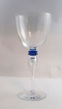 Lundin Antique presents: Attica, Royal Copenhagen with blue deco. Design Anja Kjär. Red wine glass. Height 21.5 cm.