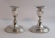 Lundin Antique presents: Hugo Grün, Copenhagen. (H.Gr). Silver candlesticks (830). A pair. Height 12.5 cm. ...