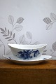 K&Co. presents: Royal Copenhagen Blue Flower curved oval sauce bowl on solid saucer.10/1651...