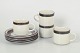 L'Art presents: Arabia Karelia, set of four tea cups with matching saucers.