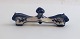 Lundin Antique presents: Royal Copenhagen. Blue fluted, plain. Knife rest. Model 135. Length 9 cm. (1 quality).