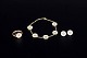 L'Art presents: Georg Jensen and Bernhard Hertz, Daisy set in gilt sterling silver.