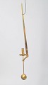 L'Art presents: Pierre Forsell for Skultuna, wall hanging pendulum candle holder.