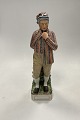 Danam Antik presents: Royal Copenhagen Overglaze Figurine of Young man from Horne No. 12230
