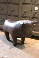 K&Co. presents: Original Dimitri Omersa leather footstool from the 60s in the shape of a bull with a nice old ...