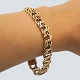 Antik Damgaard-Lauritsen presents: A bracelet of 8k gold, w. 10 mm