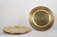L'Art presents: Set of five brass charger plates.