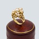 Antik Damgaard-Lauritsen presents: Ring in 18k gold set with pearls