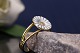 Antik Huset presents: Silver ring from Georg Jensen's Daisy series, stamped 925 and gold plated. Size 57.