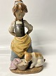 Antik Huset presents: Lladro, Spanish figurine: Girl with dog.Height 24.5 cm.