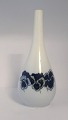 Lundin Antique presents: Royal Copenhagen. Vase with floral motif. Model 238/61. Height 21.5 cm. Produced ...