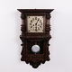 Osted Antik & Design presents: Antique Oak Wall Clock with Carved Details from the 1920s