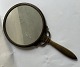 Reutemann Antik presents: Just Andersen: Hand hold mirror in bronze