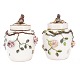 Aabenraa Antikvitetshandel presents: Two polychrome-decorated lidded vases, plastically modelled and decorated ...