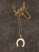 Middelfart Antik presents: 8 carat gold horseshoe pendant