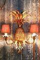 K&Co. presents: Decorative, French pineapple shaped wall lamp in Maison Charles style in gilded metal from ...