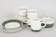 L'Art presents: Olle Alberius for Rörstrand, set of four coffee cups with saucers, sugar bowl and creamer.