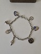 Karstens Antik præsenterer: Vintage sølvarmbånd med 7 charms