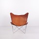 Osted Antik & Design presents: Bat Lounge Chair in Cognac Leather and Steel from the 1960s