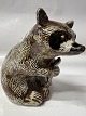 Antik Huset presents: Raccoon with fish Søholm. Bornholm pottery.H. 17 x W. 13 cm.