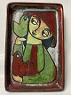 Antik Huset presents: Relief, in glazed ceramic girl with birds, Bornholm pottery, Michael Andersen.
