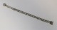 Lundin Antique præsenterer: Georg Jensen. Sterling sølvarmbånd (925). Model 50. Længde 20,6 cm. Produceret ...