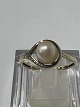 Antik Huset presents: 8 carat Ladies' ring with 2 diamonds and a white pearl.Size 58.